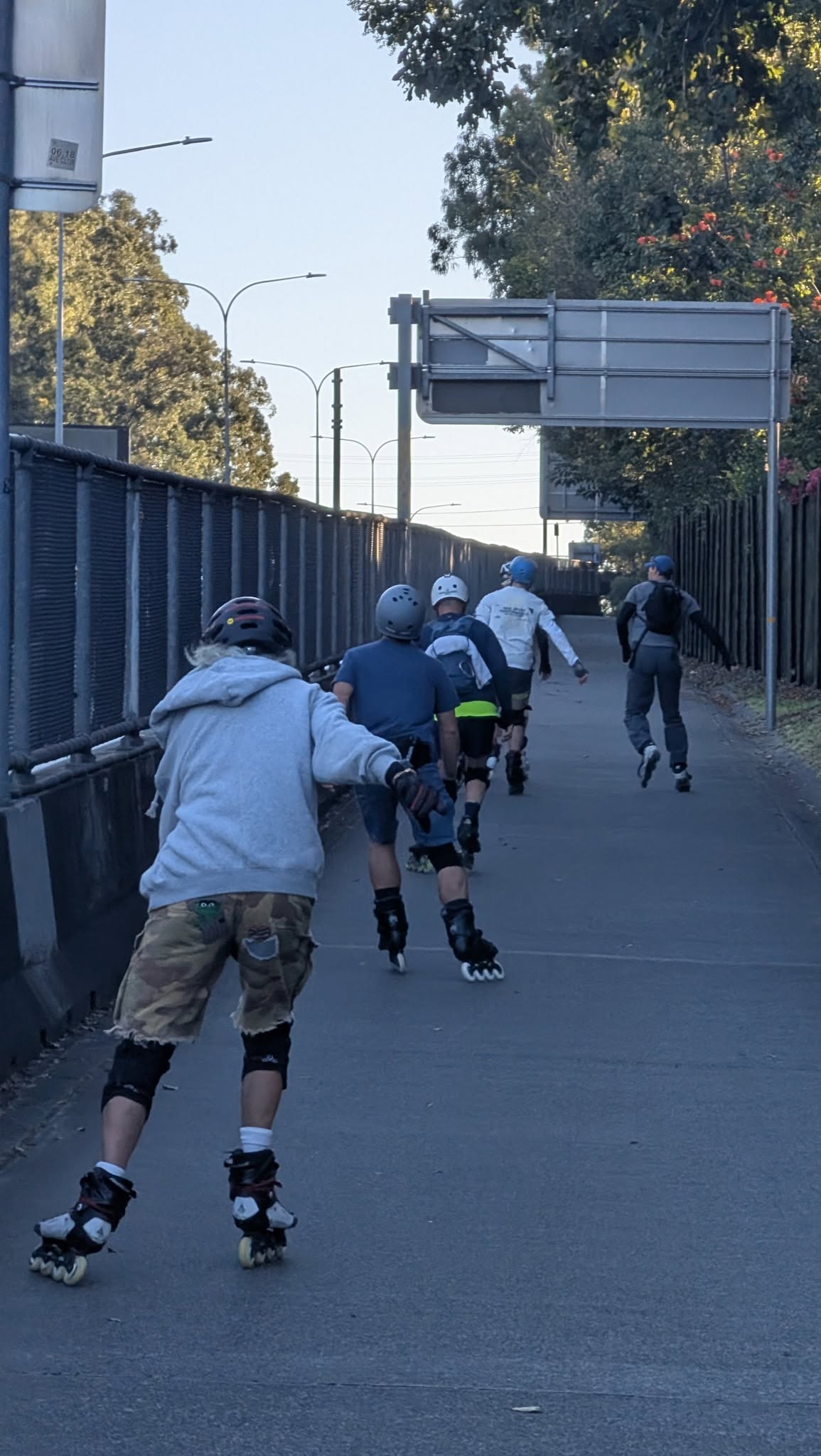 Group of inline skaters following a shared path in Brisbane